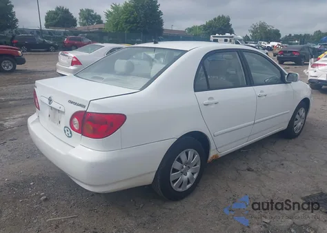 2003 Toyota Corolla Le z USA, uszkodzony, nr VIN JTDBR32E730043196